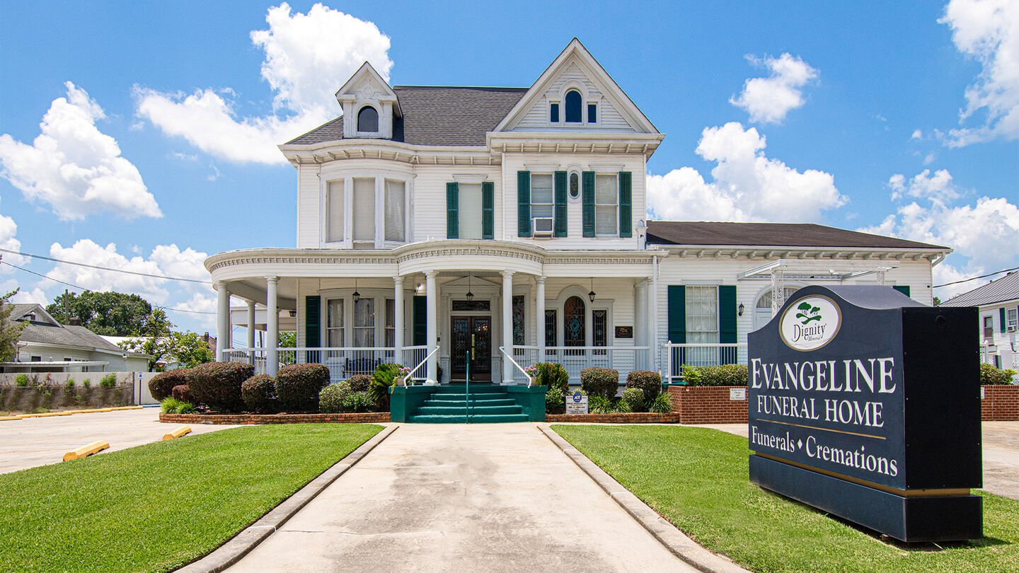 The historic two-story white antebellum home of Evangeline Funeral Home on East Saint Peter Street in New Iberia